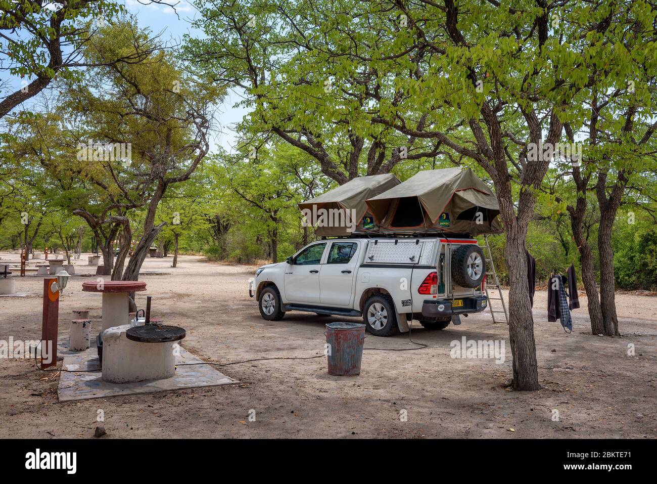 Tent located on the roof of a pickup 4x4 car in a camp in Etosha National Park Stock Photo