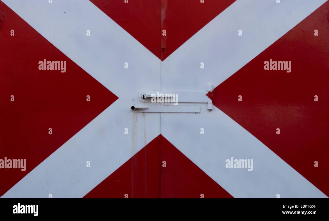 White flag with diagonal red cross hires stock photography and images