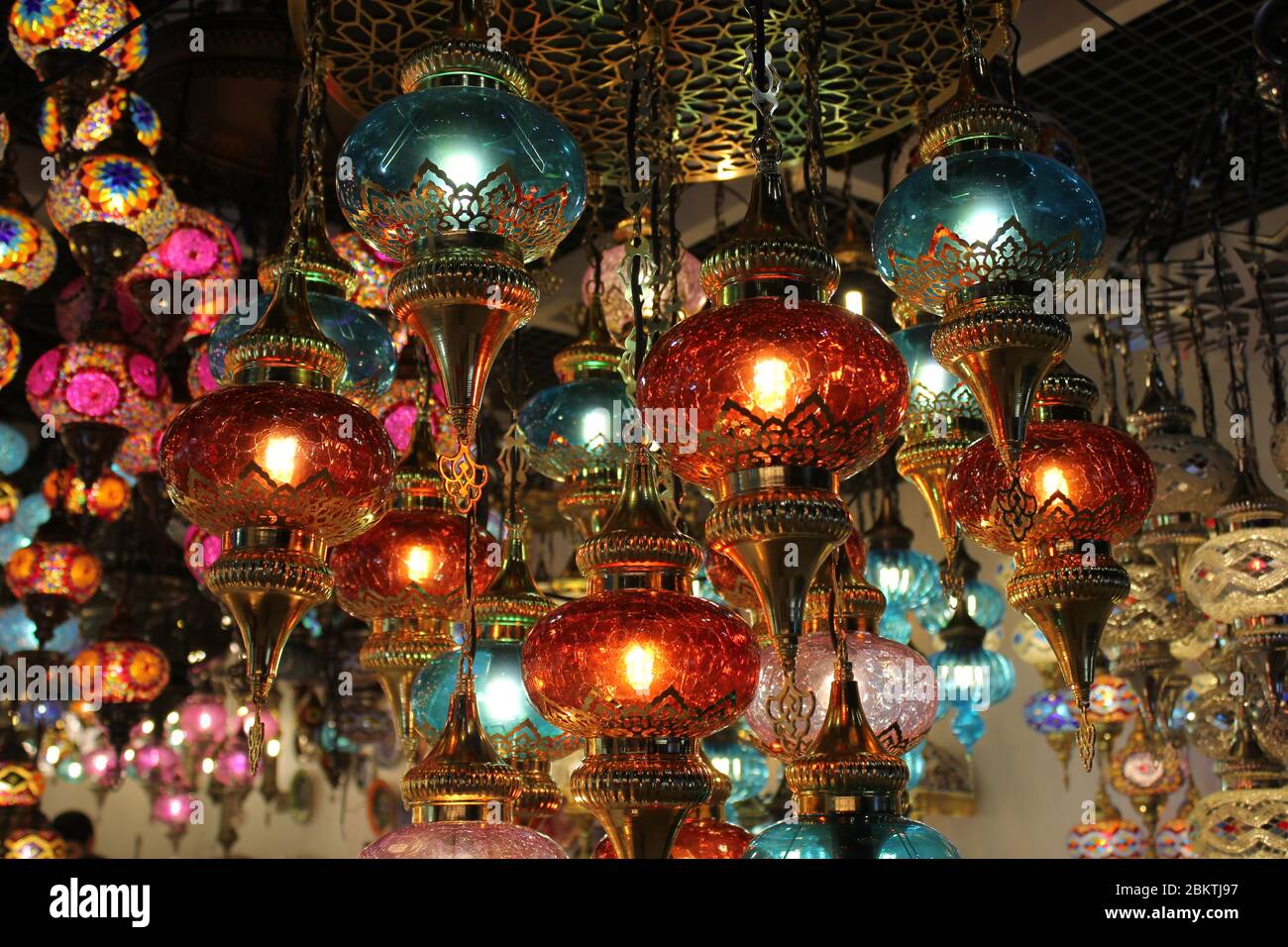 Traditional oriental hanging lamps in beautiful colors symbolize the Islamic fasting month of Ramadan and Eid Al Fitr and Eid Al Adha festivals. Stock Photo