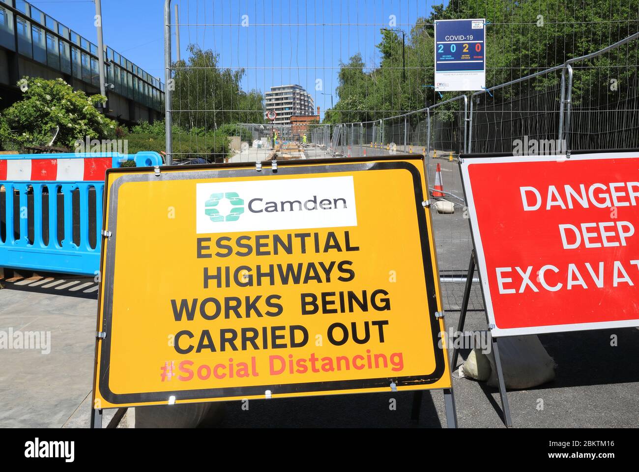 Social distancing in Camden Council essential road works, in the coronavirus pandemic, in London, UK Stock Photo