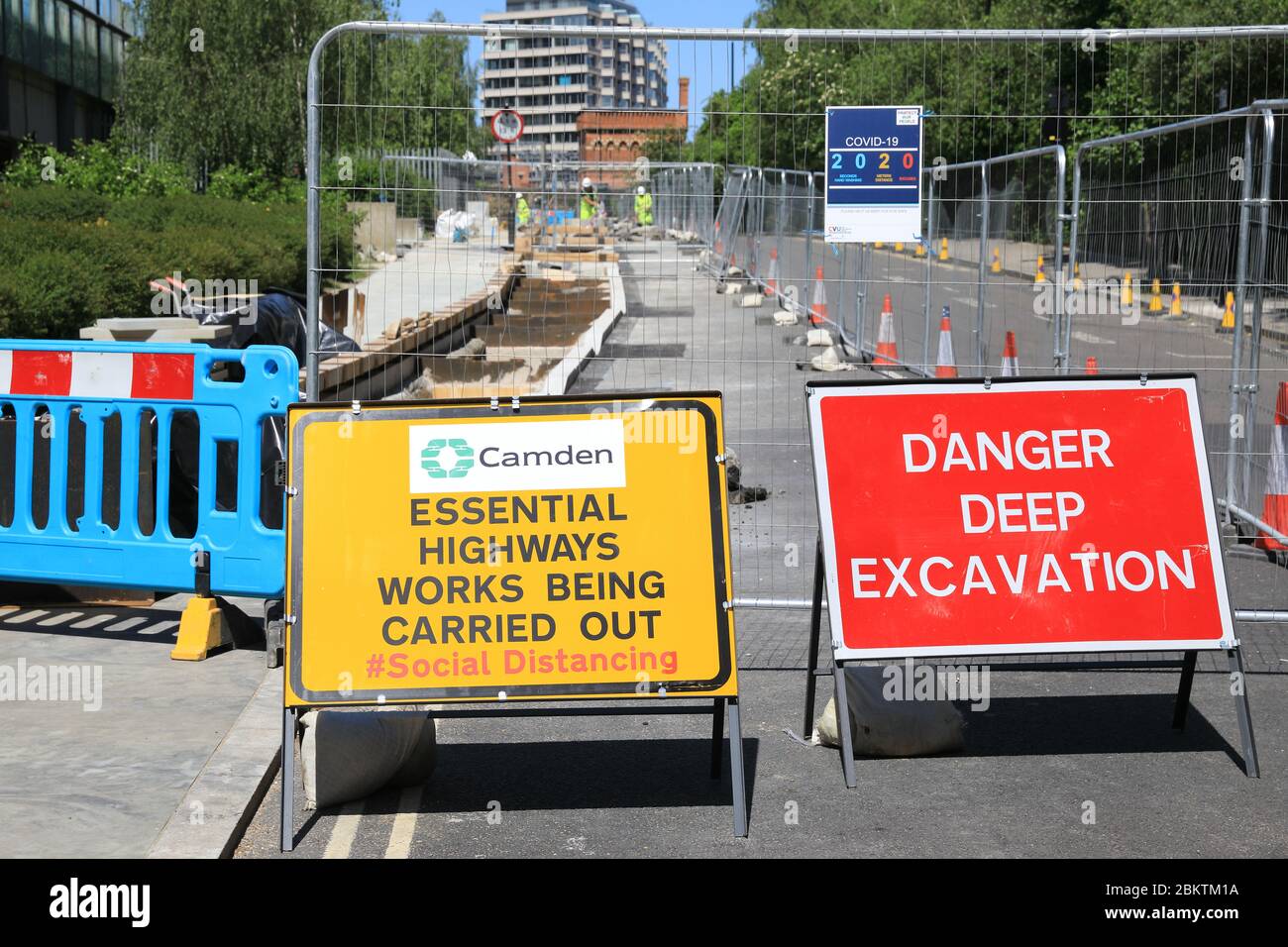 Social distancing in Camden Council essential road works, in the coronavirus pandemic, in London, UK Stock Photo