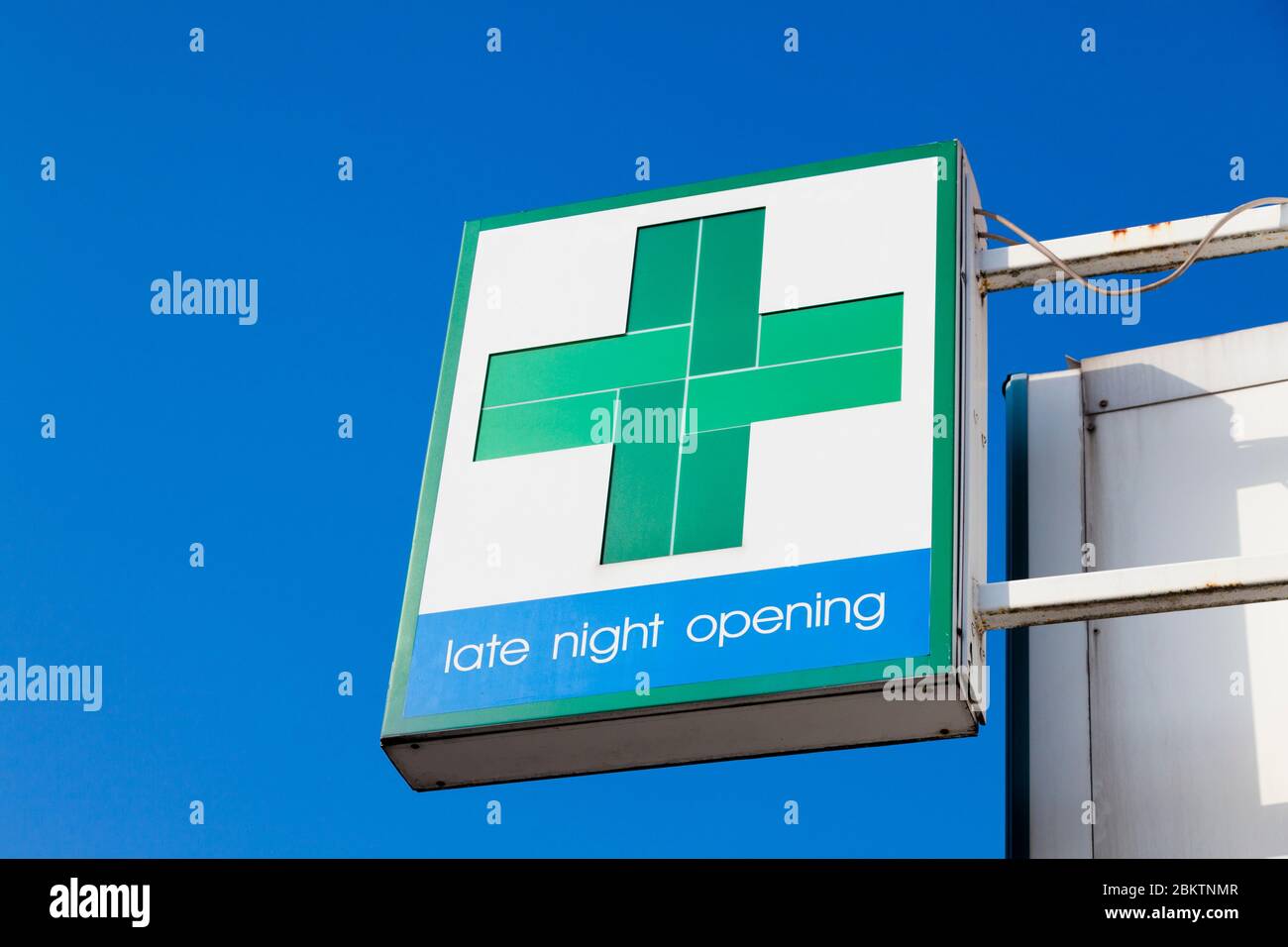 Sign above a pharmacy shop, late night opening, Beckenham, London, UK Stock Photo