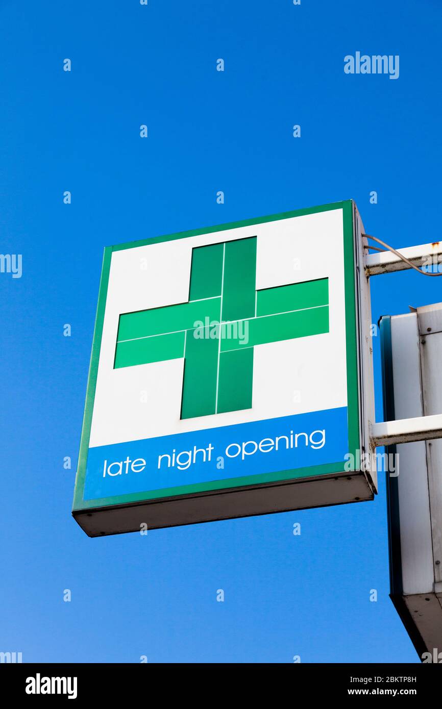 Sign above a pharmacy shop, late night opening, Beckenham, London, UK Stock Photo