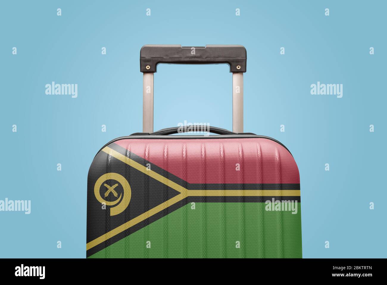 Suitcase with Vanuatu flag design travel America concept. Stock Photo