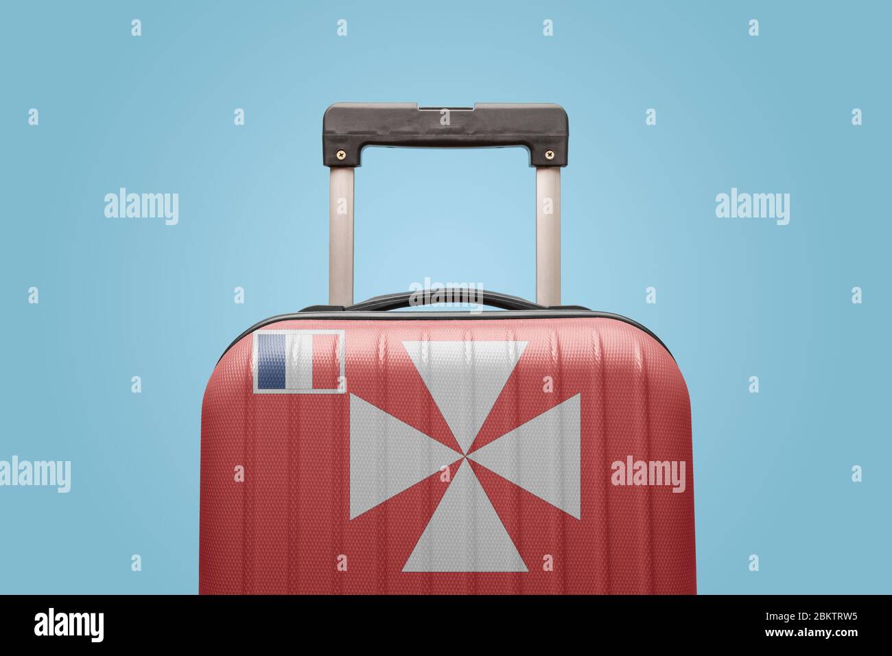 Suitcase with Wallis & Futuna flag design travel America concept. Stock Photo