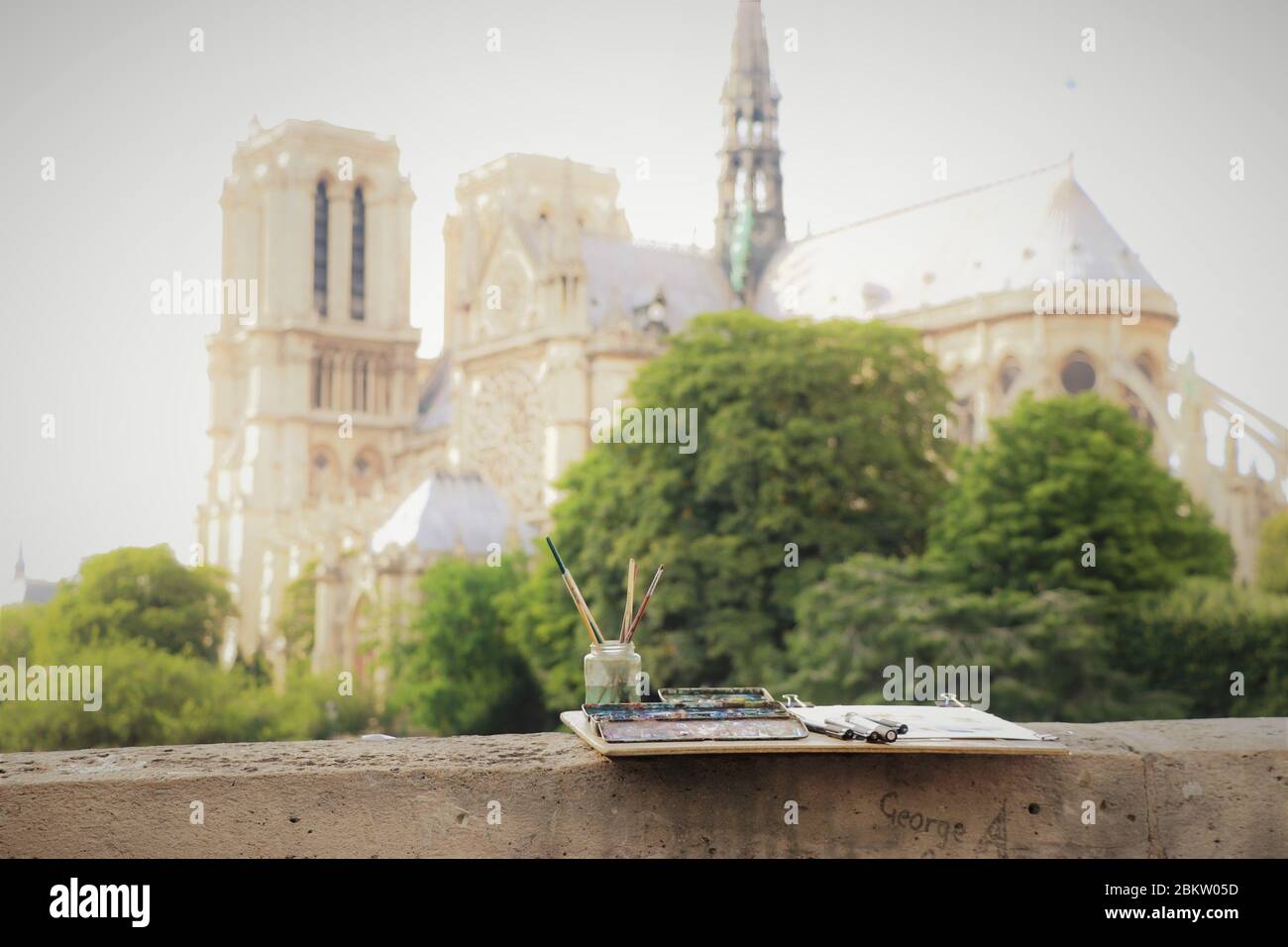 A Painter's Tools, Along the Seine Overlooking the Notre Dame. Paris. Stock Photo