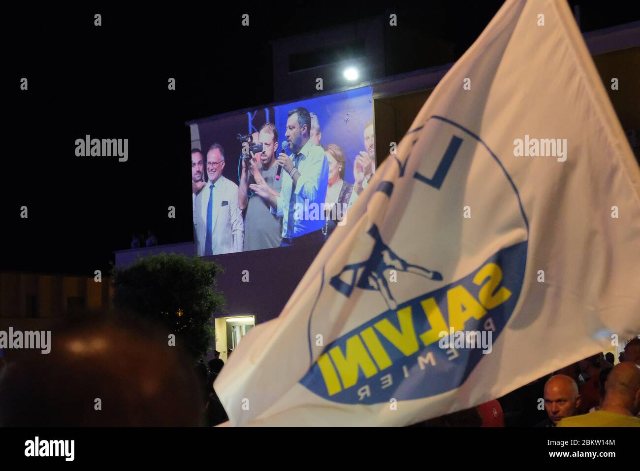 Matteo Salvini conducts a La Lega rally in Sabaudia, south of Rome. He speaks about immigration, traditional Italian values, globalisation and identity. The town's inhabitants are not traditional La Lega voters but Salvini's presence brought out a curious, if not sceptical, crowd. Stock Photo