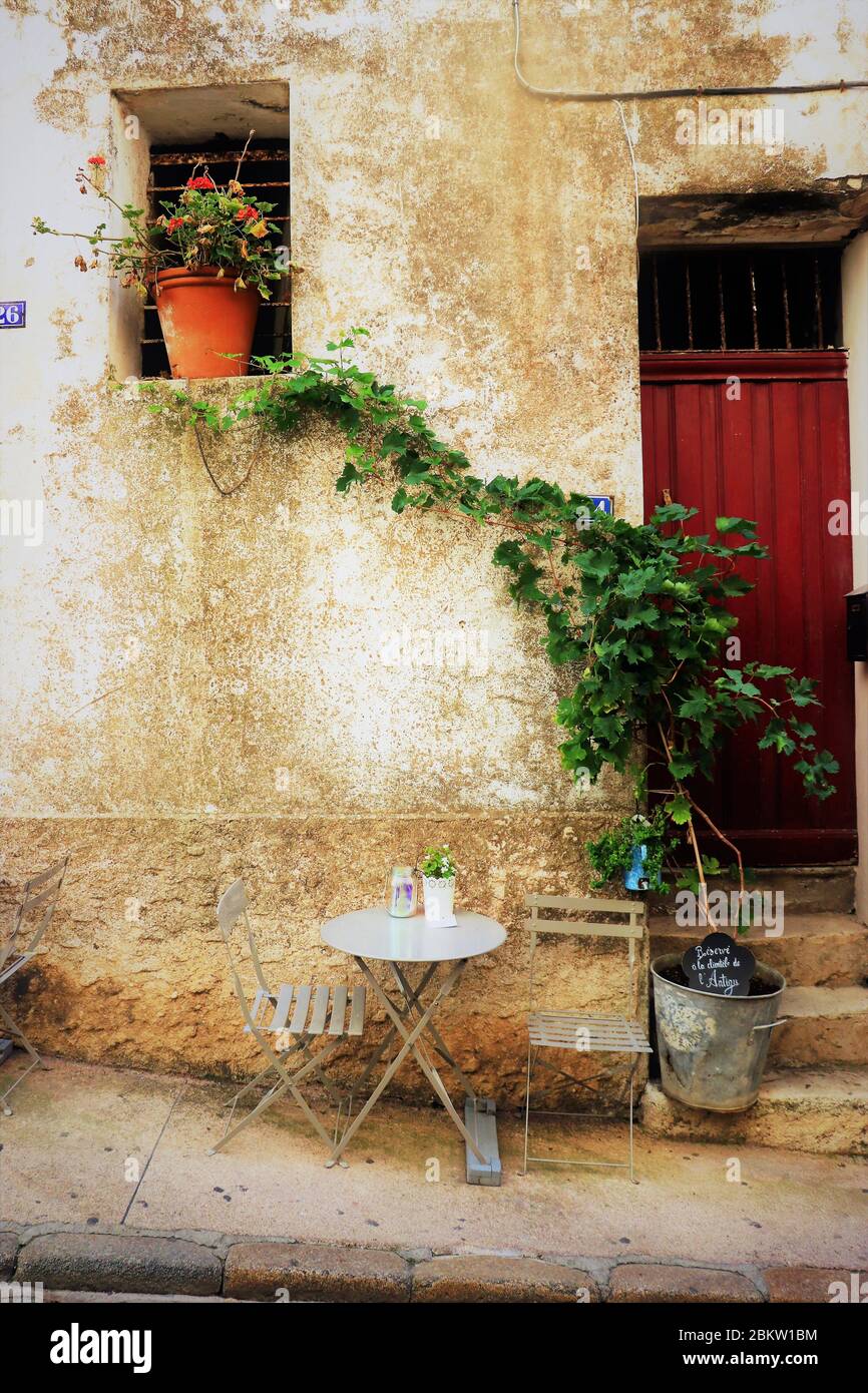 Picturesque Outdoor Cafe Seating. Bonifacio, Corsica, France Stock Photo