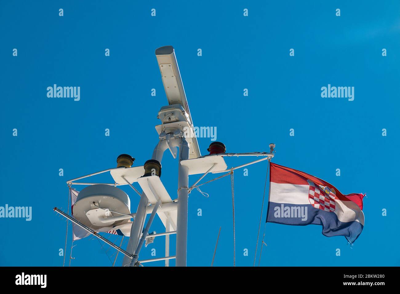 Croatian flag waving in smal winnd on the blue sky Stock Photo