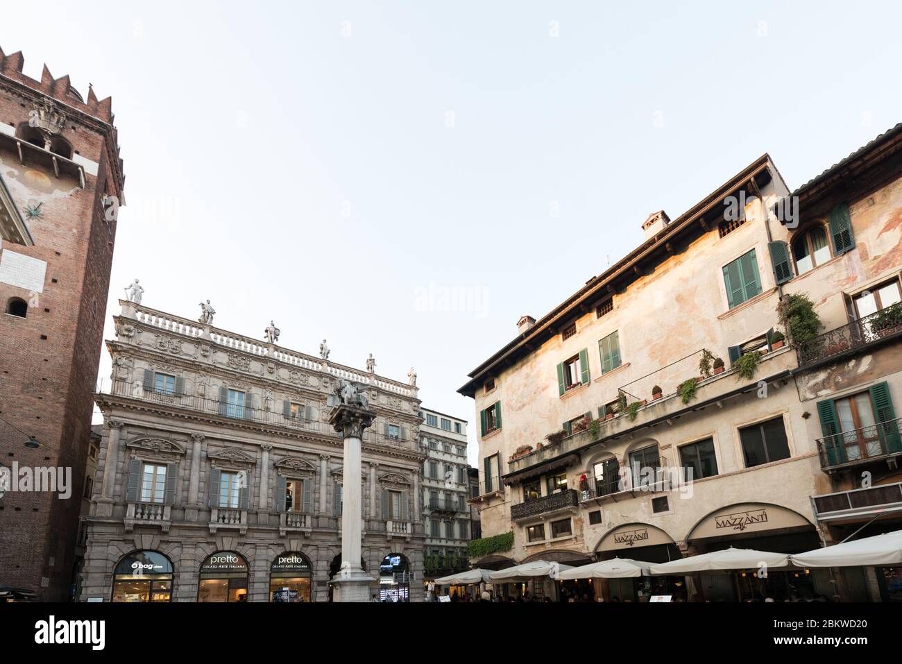 VERONA, ITALY - 14, MARCH, 2018: Wide angle picture of old buildings of Piazza delle Erbe, sightseeing of Verona, Italy Stock Photo