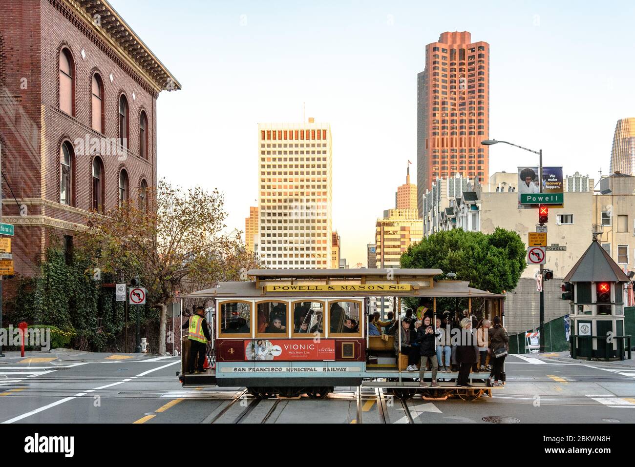 A San Francisco cable car from the Powell-Mason Line crossing California Street Stock Photo