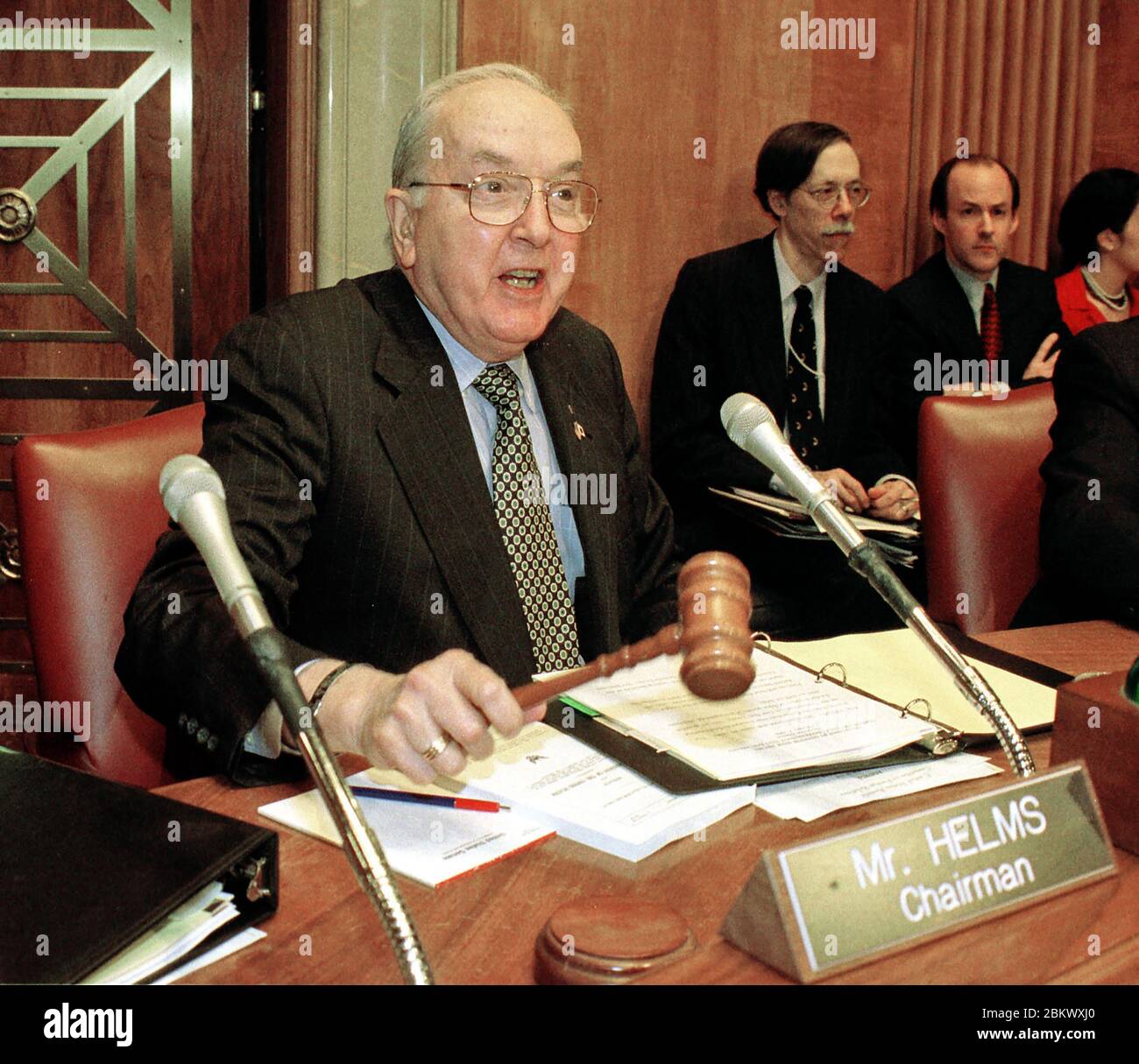 United States Senator Jesse Helms (Republican of North Carolina), Chairman, US Senate Foreign Relations Committee, calls the committee to order on Capitol Hill in Washington, DC on October 7, 1999.  The committee is holding a hearing to consider the Comprehensive Test Ban Treaty. Credit: Ron Sachs / CNP / MediaPunch Stock Photo