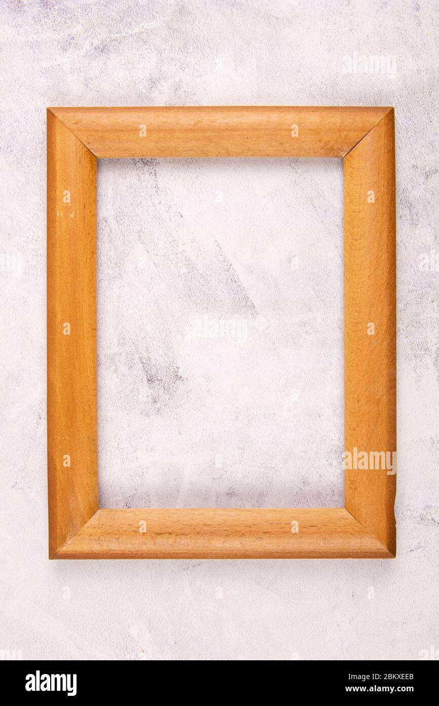 Elegance wooden blank photo frame on marble shelf. Top views with clear space Stock Photo