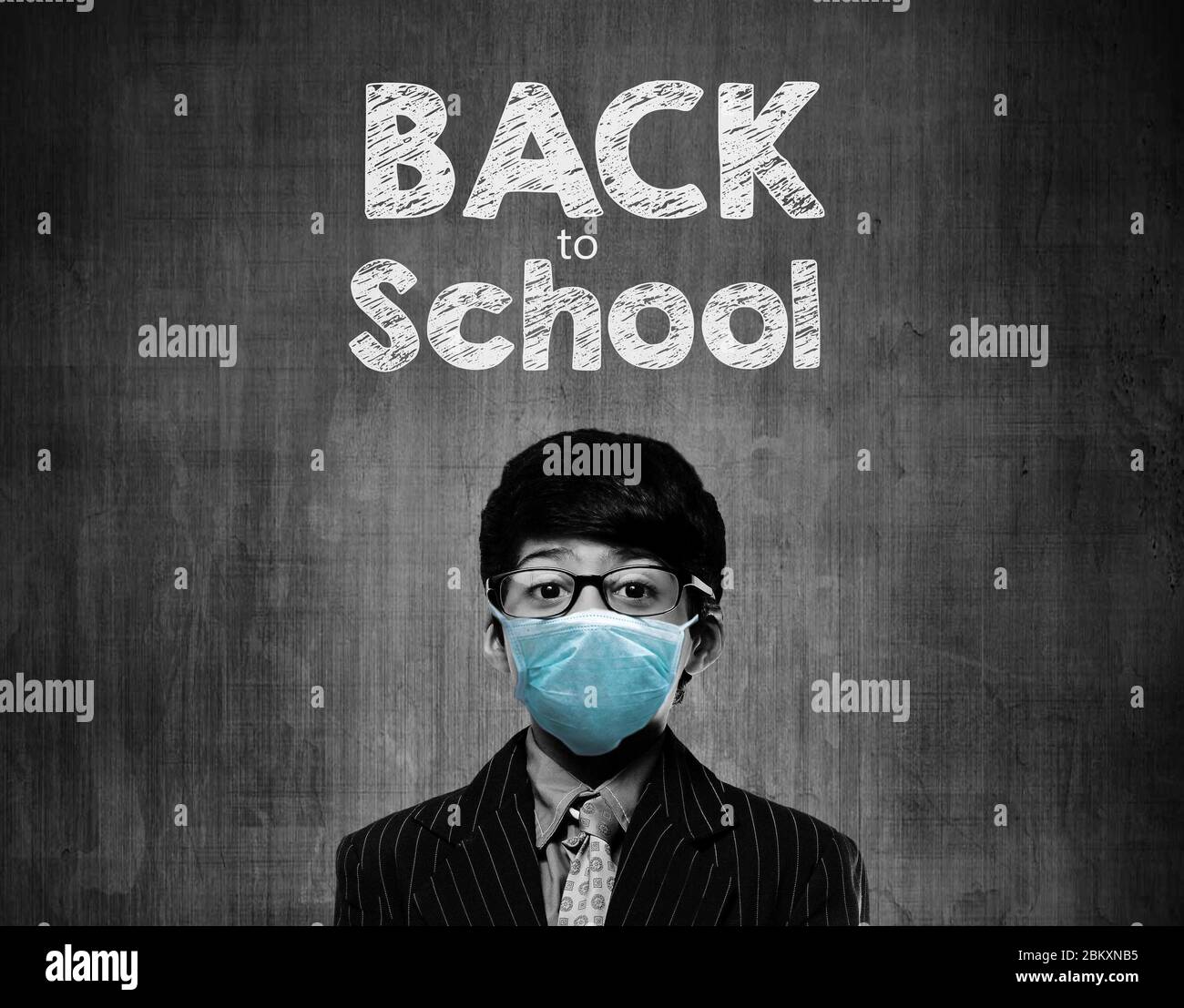 Back To School - Little School Kids Wearing Surgical Mask For Safety And Protection During Pandemic - Coronavirus - Covid 19 Stock Photo