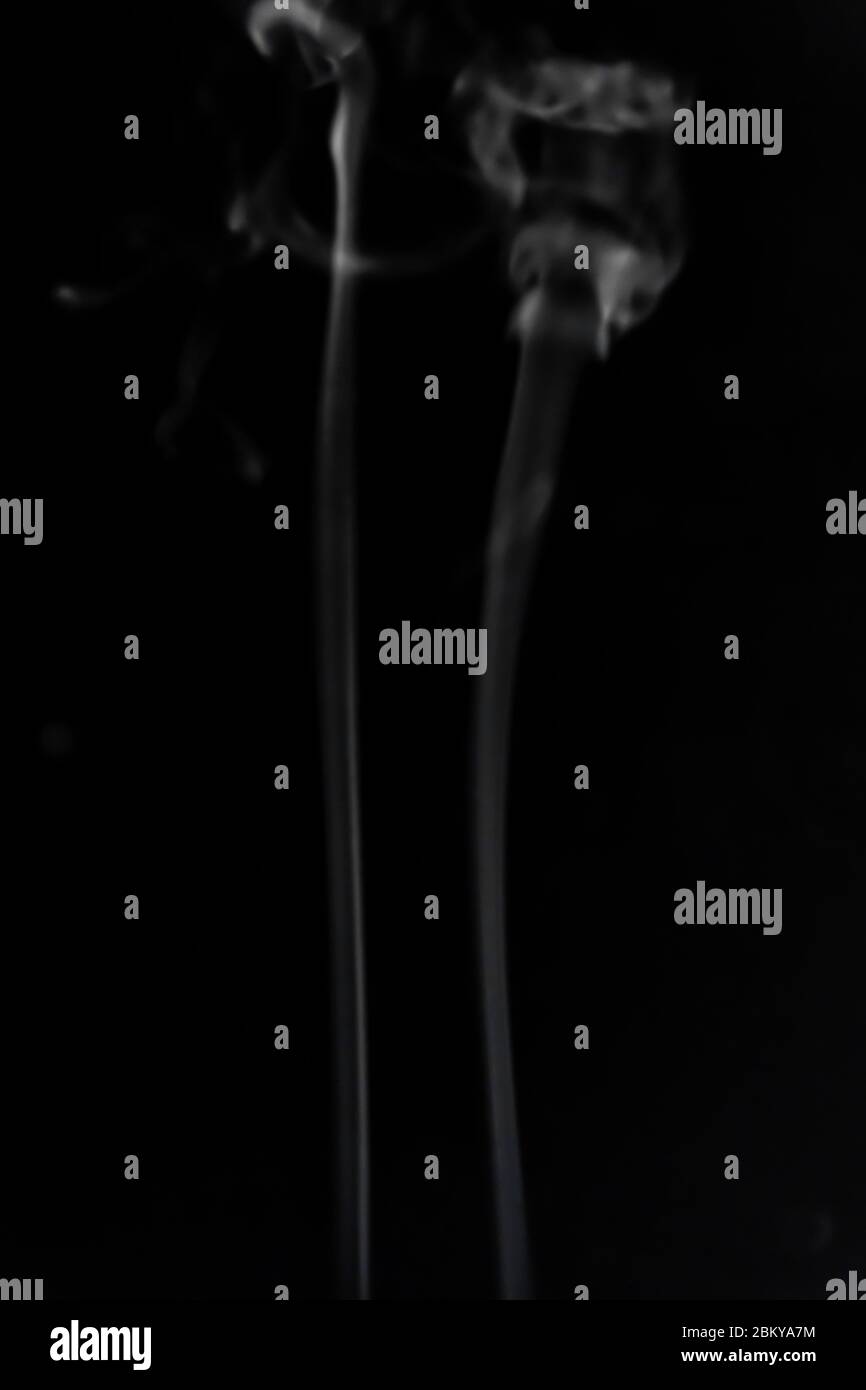 White smoke on black background photography Stock Photo - Alamy