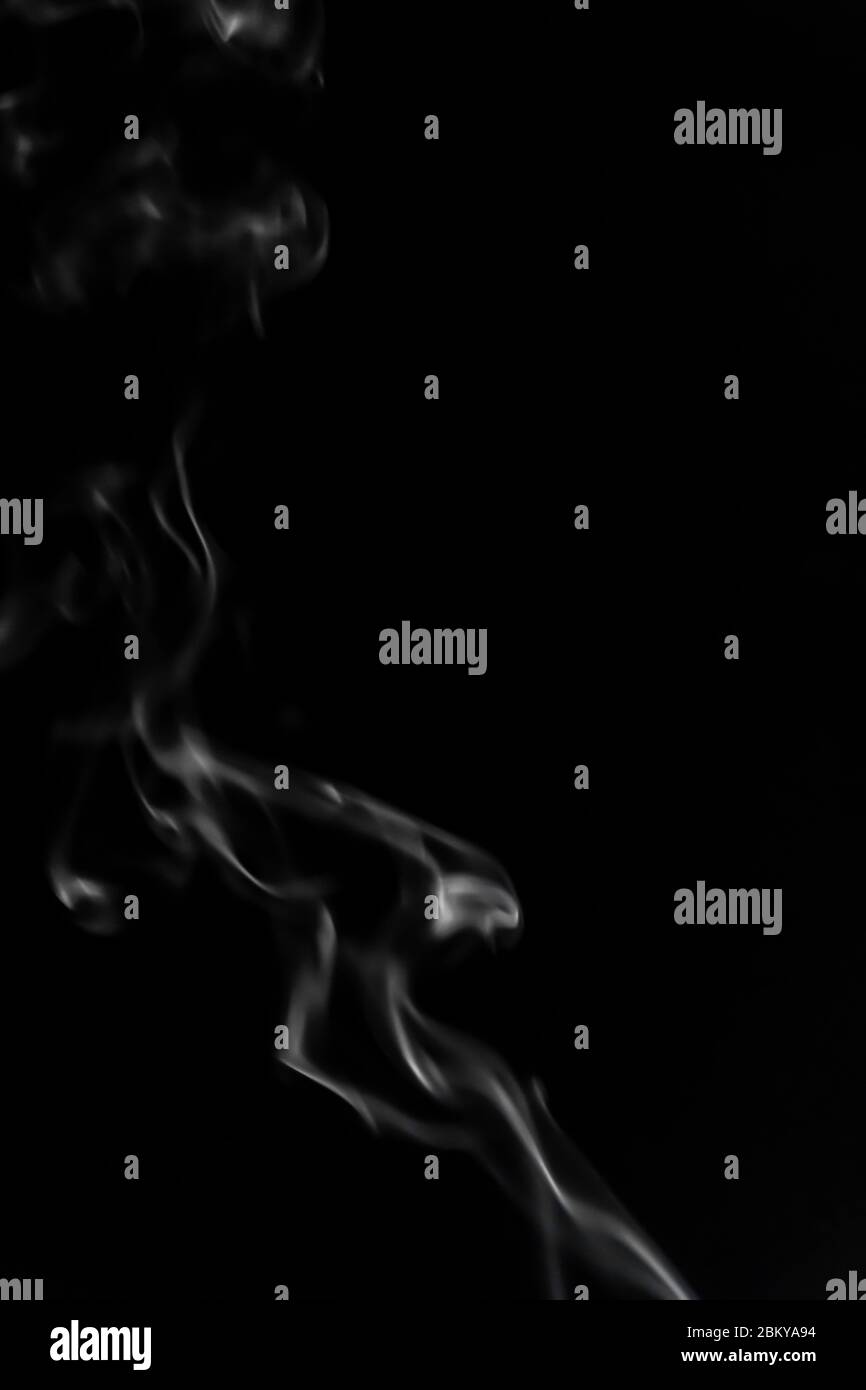 White smoke on black background photography Stock Photo - Alamy