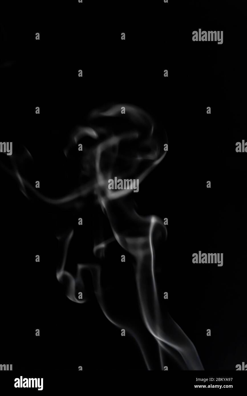 White smoke on black background photography Stock Photo - Alamy