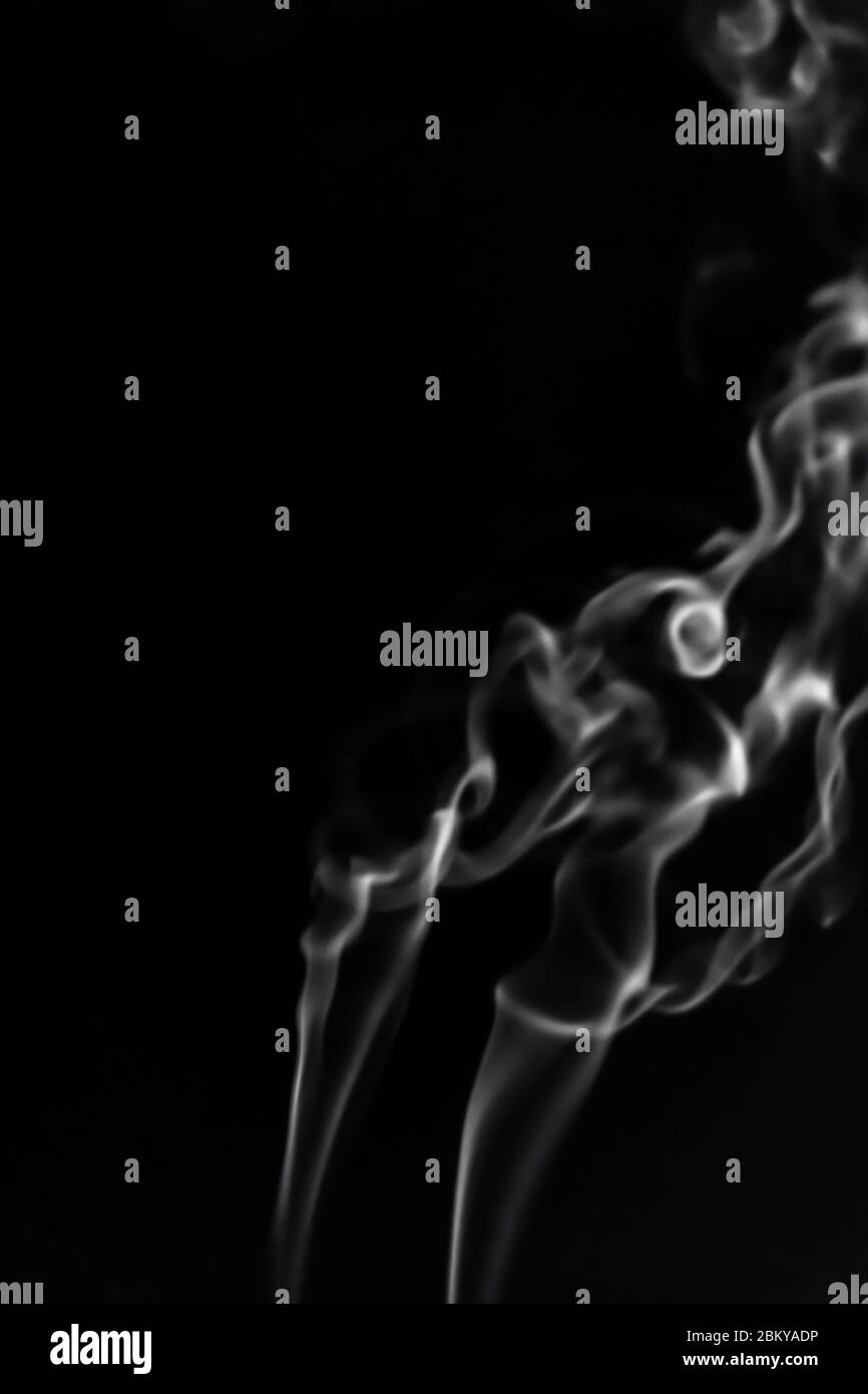 White smoke on black background photography Stock Photo - Alamy