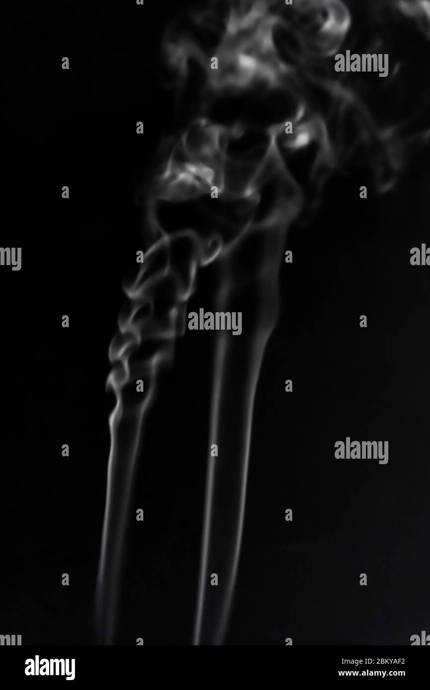 White smoke on black background photography Stock Photo - Alamy