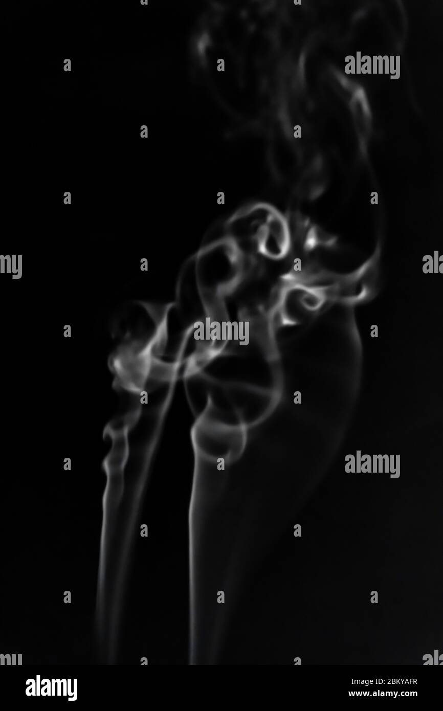 White smoke on black background photography Stock Photo - Alamy