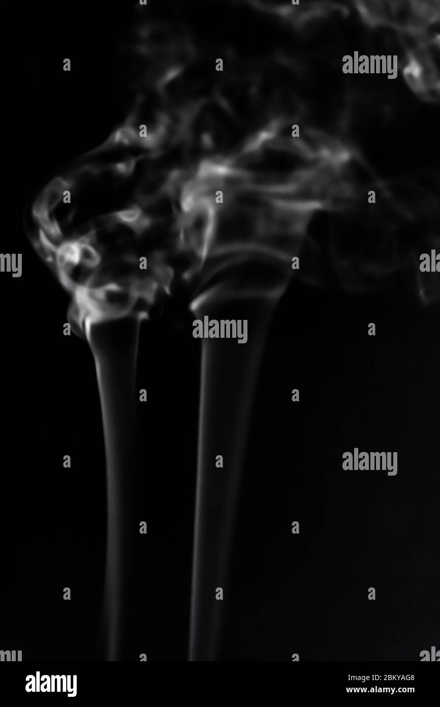 White smoke on black background photography Stock Photo - Alamy