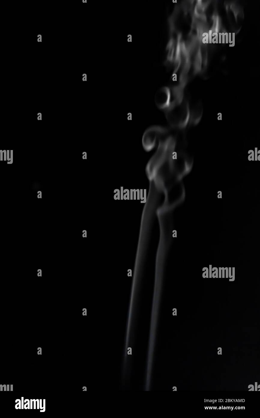 White smoke on black background photography Stock Photo - Alamy