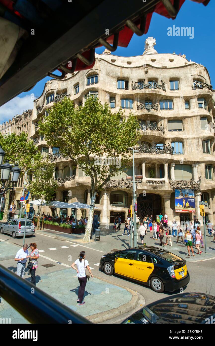 Gaudi designed apartment building with street cafe (Barcelona, Spain) Stock Photo
