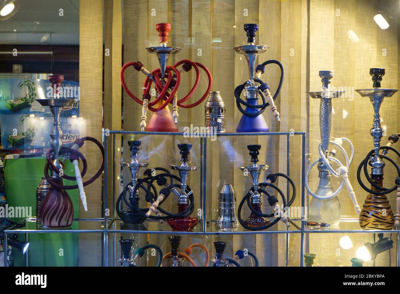 Decorative hookah pipes in a shop window in central Barcelona, Catalonia, Spain Stock Photo