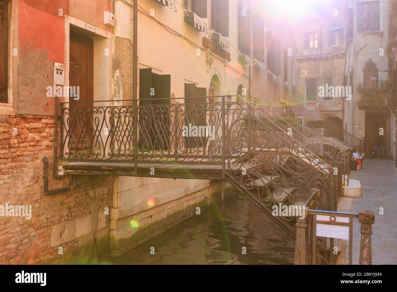 Venice canal scene with wrought iron railing hi-res stock photography ...