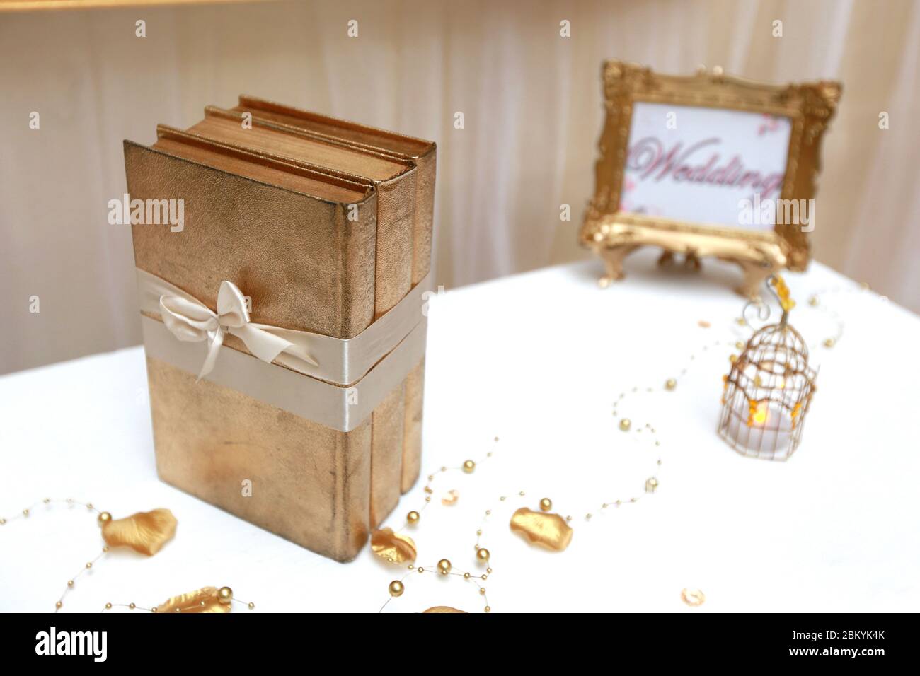 Books tied with ribbon hi-res stock photography and images - Alamy