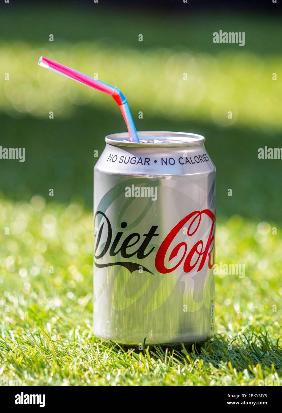 Open Can of Diet Coke with Plastic Straw, Diet Coke is made by The CocaCola Company and was