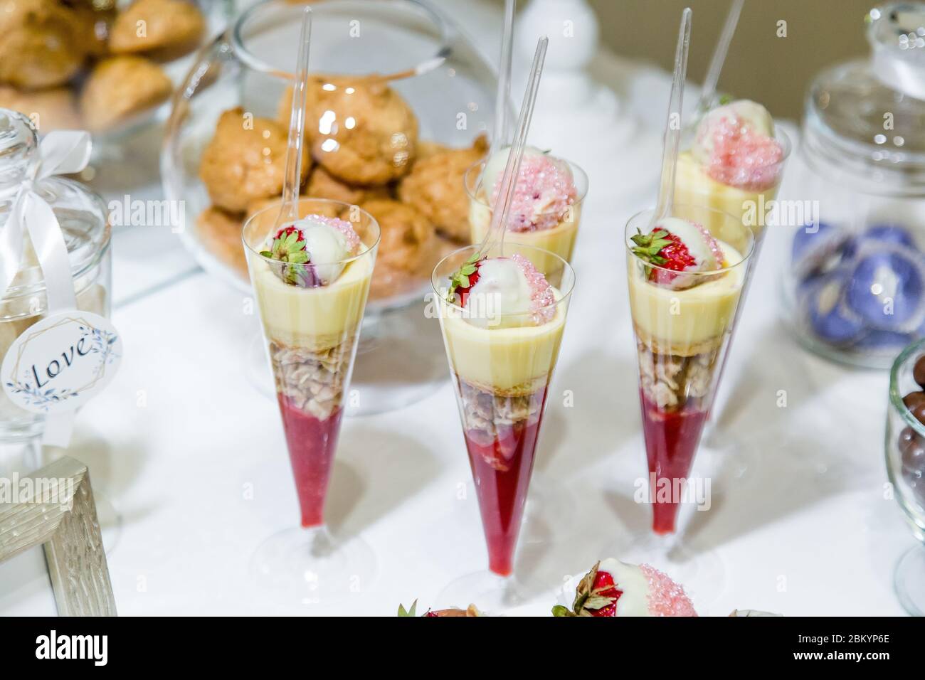 Fresh sweets on a festive table in the restaurant. Stock Photo