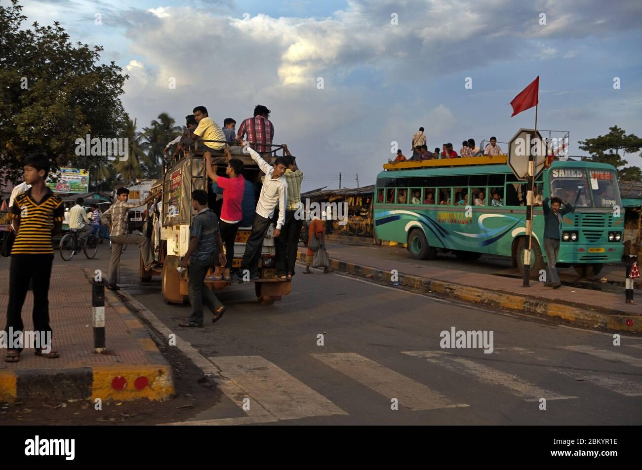 Street life and public transportation in a junction of Kolaghat, a census town in Purba Medinipur district, West Bengal state, India. © Reynold Sumayku Stock Photo