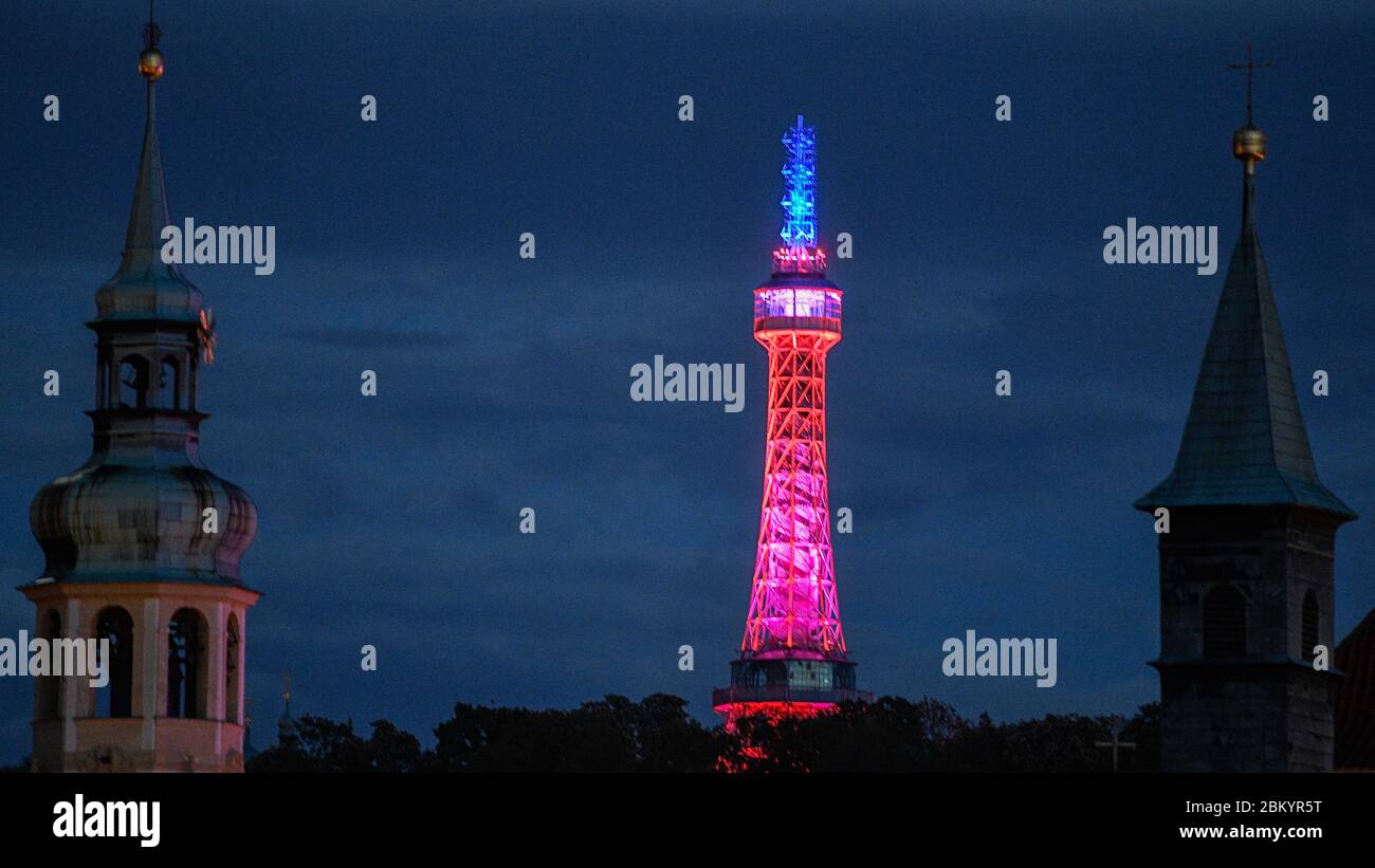 Prague, Czech Republic. 05th May, 2020. The lookout tower on Prague's Petrin Hill shines in colours within the across-the-world gesture 'Giving Tuesday' of homage to the generosity and good deeds reacting to the coronavirus pandemic, in Prague, Czech Republic, on May 5, 2020. Credit: Michal Kamaryt/CTK Photo/Alamy Live News Stock Photo