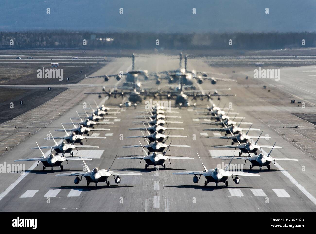 U S Air Force F 22 Raptors E 3 Sentrys C 17 Globemaster Iiis C 130j Herculeses And C 12f Hurons Participate In A Close Formation Taxi Known As An Elephant Walk At Joint Base Elmendorf Richardson Alaska May