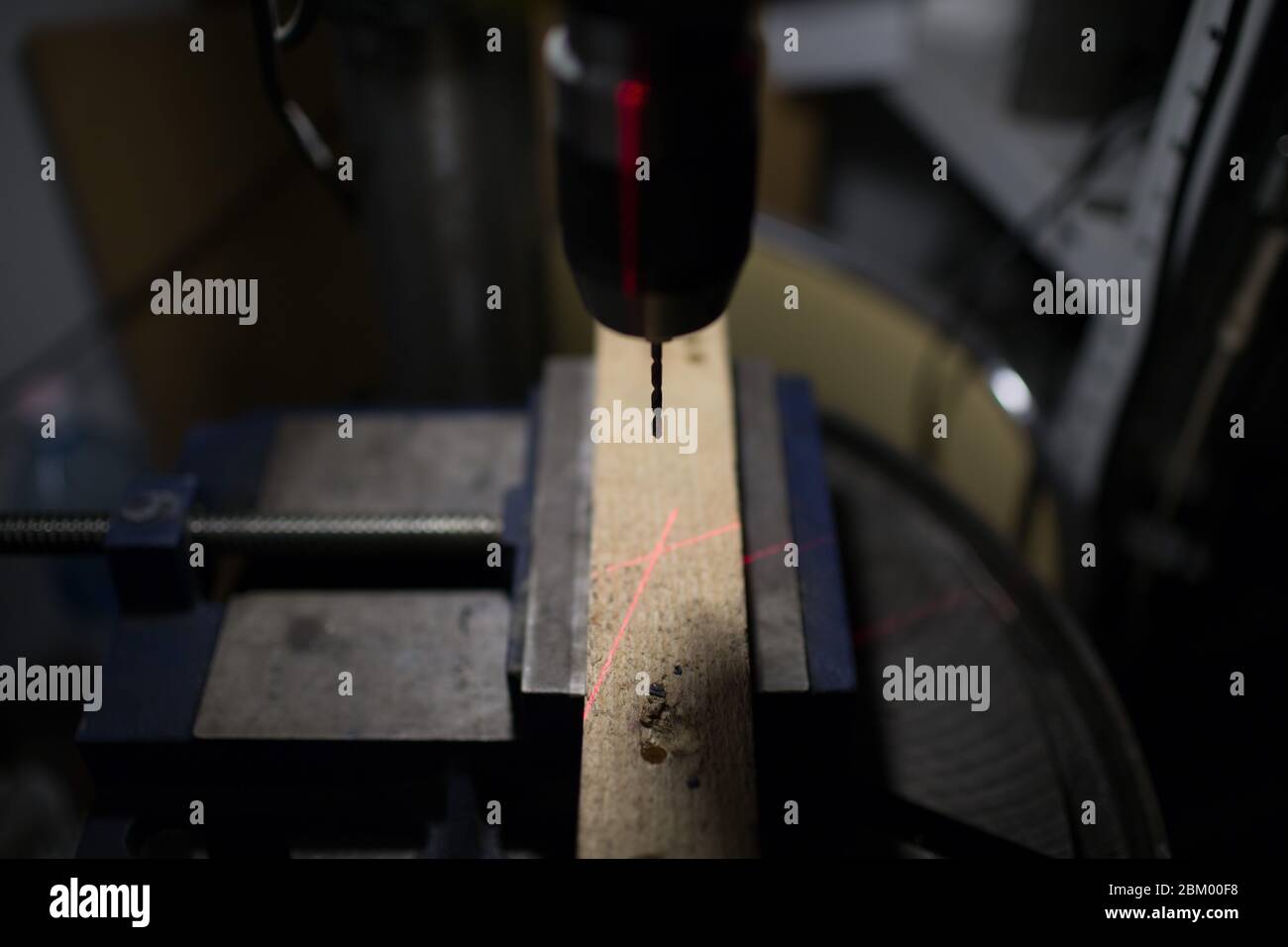 Drilling machine with laser sight in the workshop Stock Photo