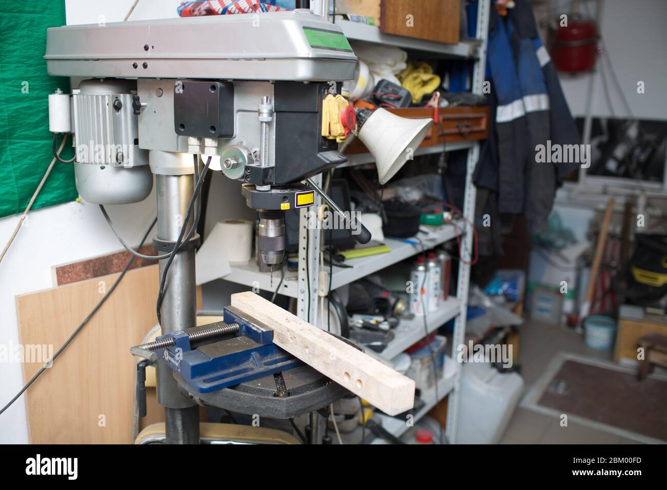 Drilling machine with laser sight in the workshop Stock Photo