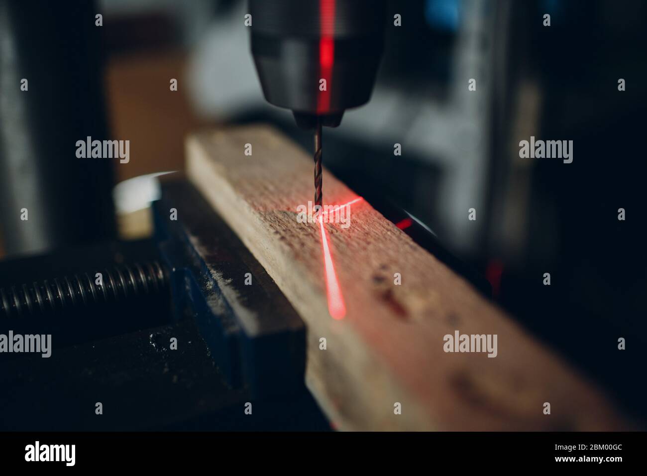 Drilling machine with laser sight in the workshop Stock Photo