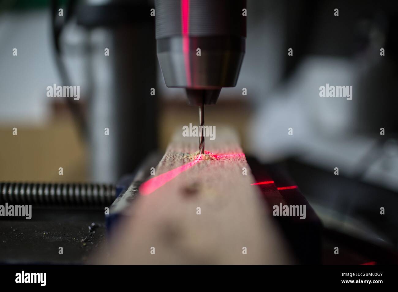 Drilling machine with laser sight in the workshop Stock Photo