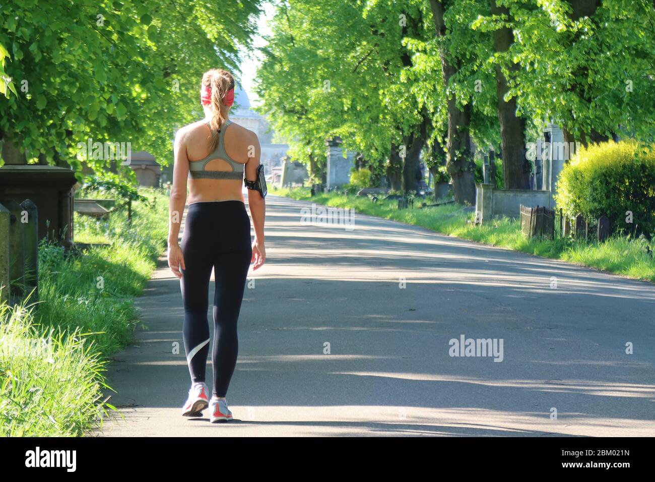 London, UK. 6th May, 2020. People get up early to exercise in the sunshine in Brompton Cemetery, West London. Credit: Brian Minkoff/Alamy Live News Stock Photo