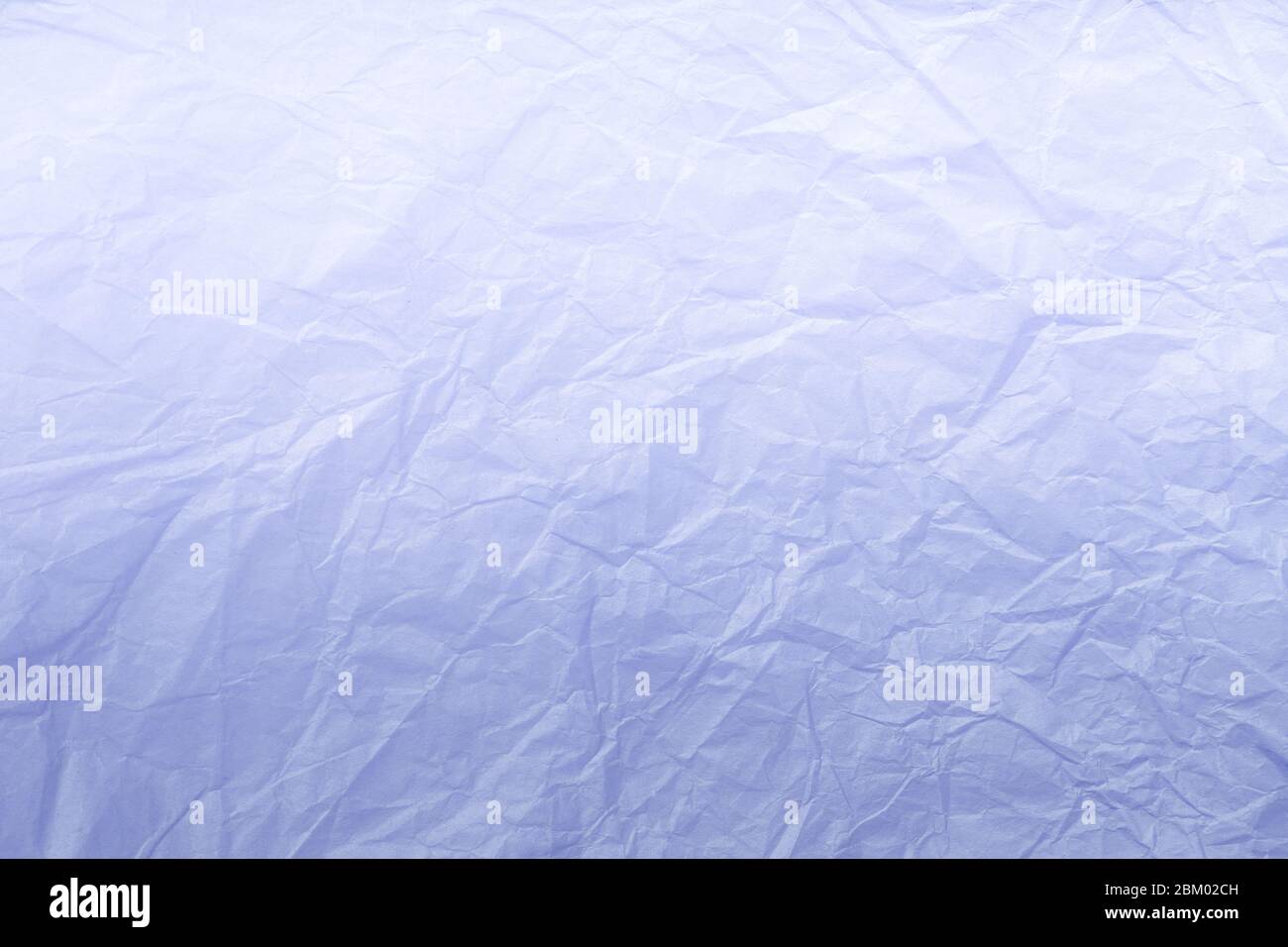 Texture of crumpled navy blue wrapping paper with white gradient