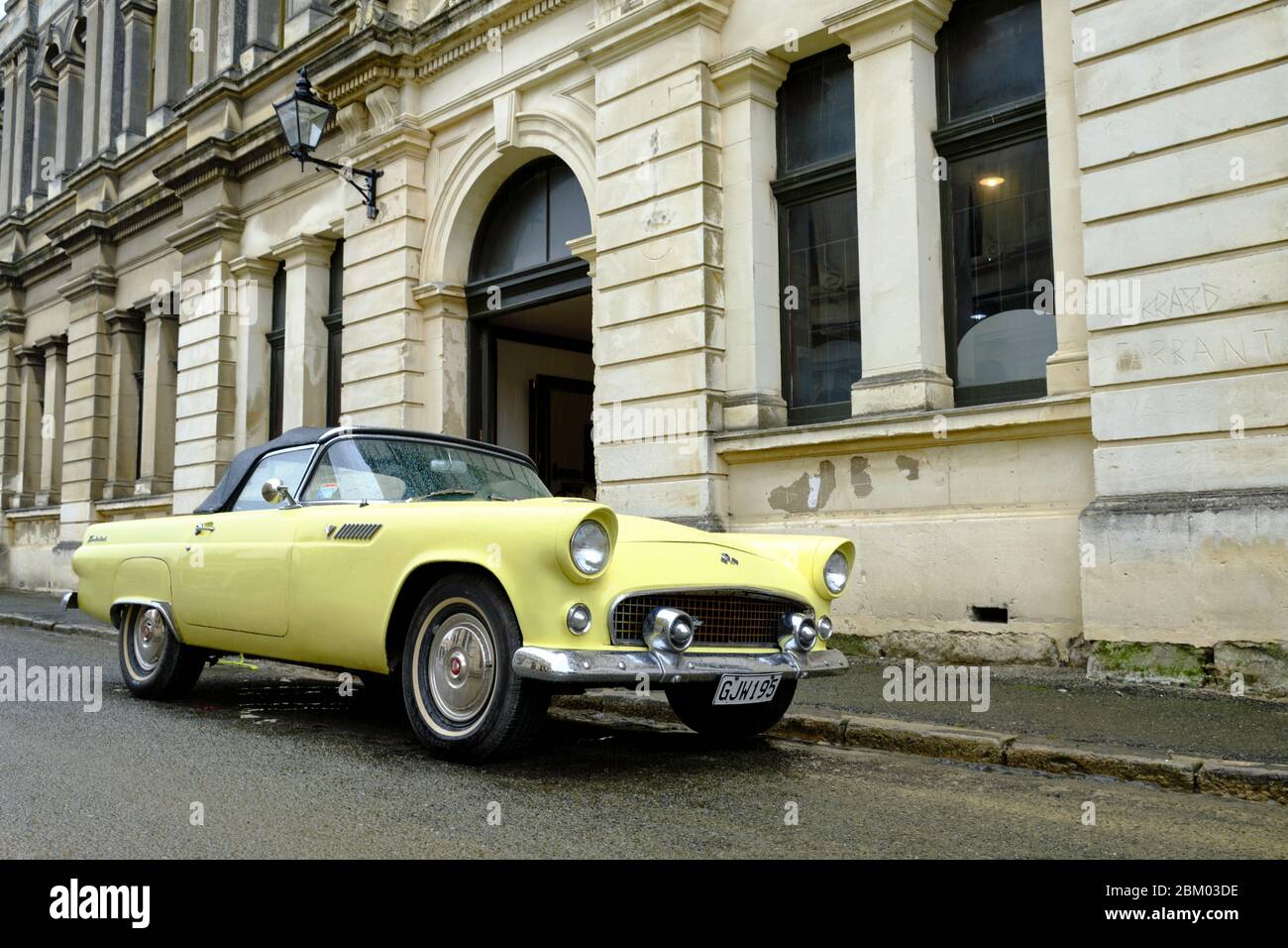 Vintage Car Parked Next To A Classic Building On Oamaru Harbor Street Considered The Steampunk Capital Of The World Stock Photo Alamy