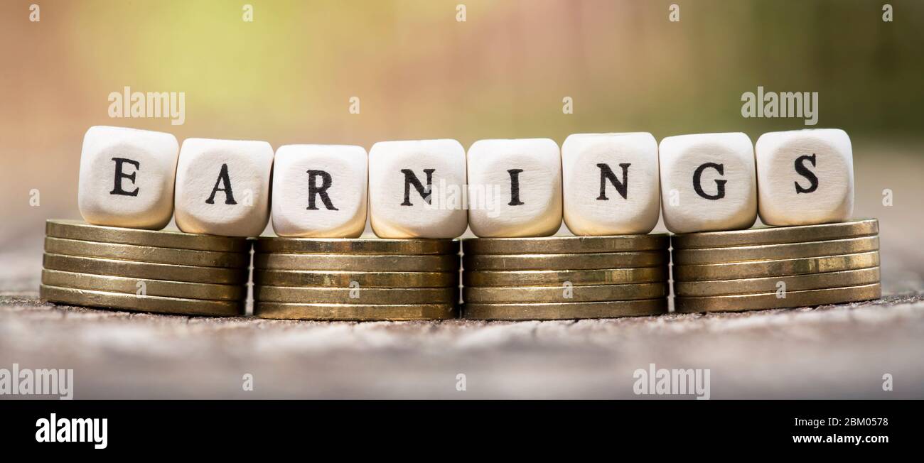 Earn money, earnings concept web banner of gold coins with text Stock