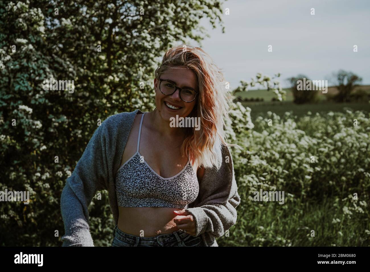 Blonde woman dancing hi-res stock photography and images - Alamy