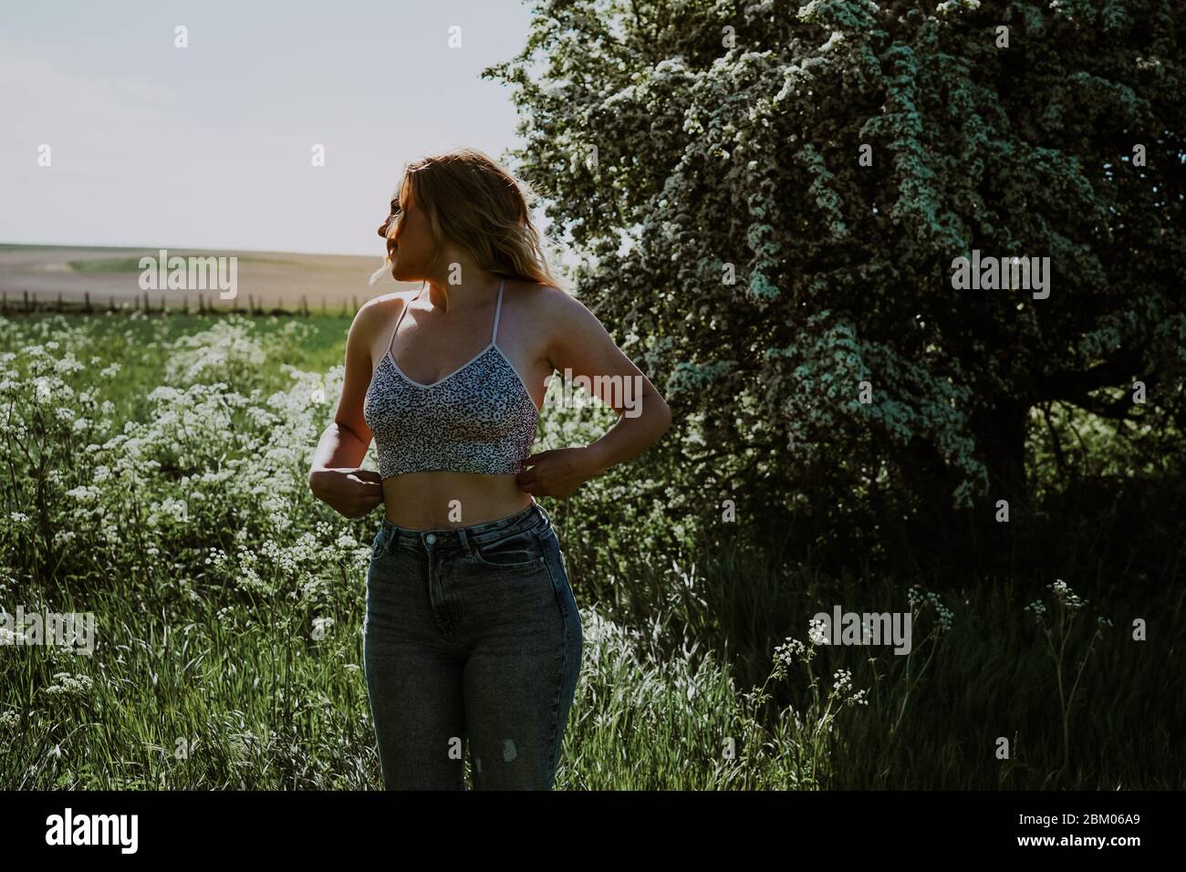 Blonde woman dancing hi-res stock photography and images - Alamy