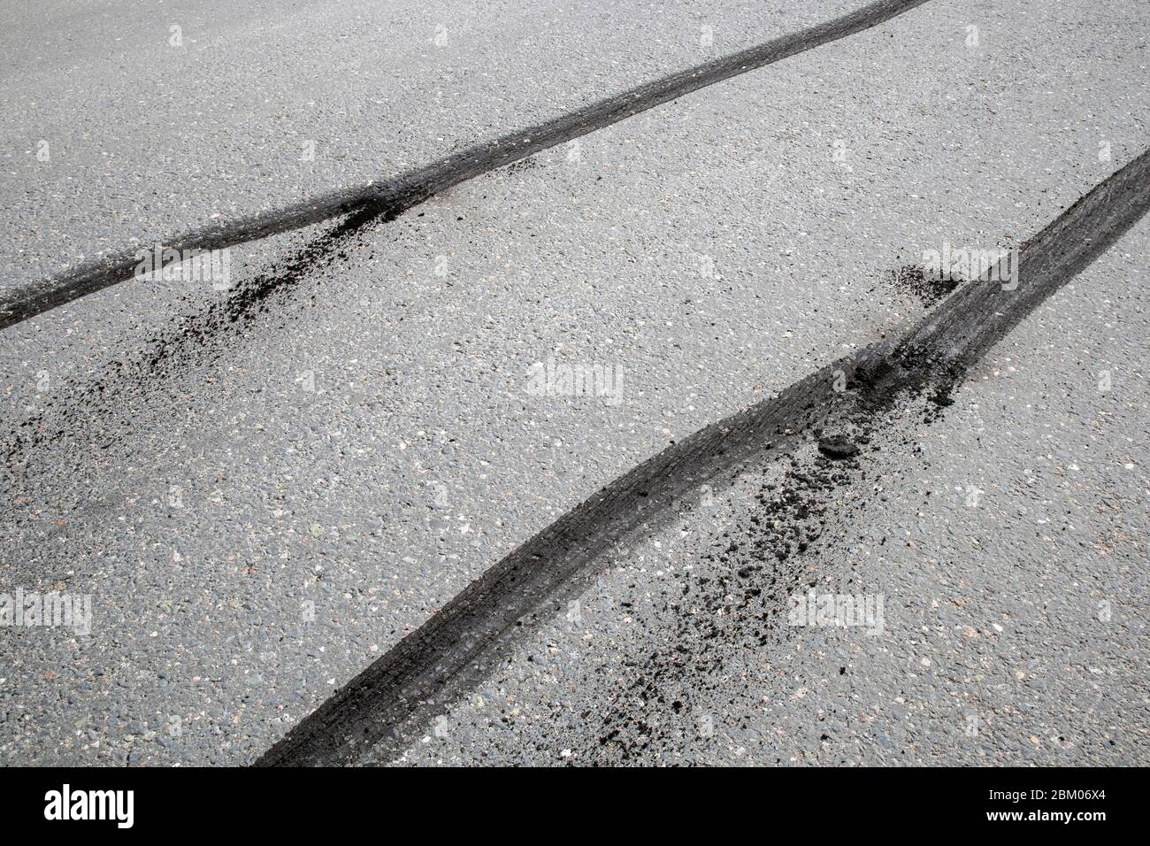 car tyre skid marks on road Stock Photo - Alamy
