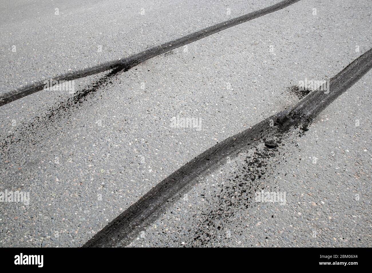 car tyre skid marks on road Stock Photo