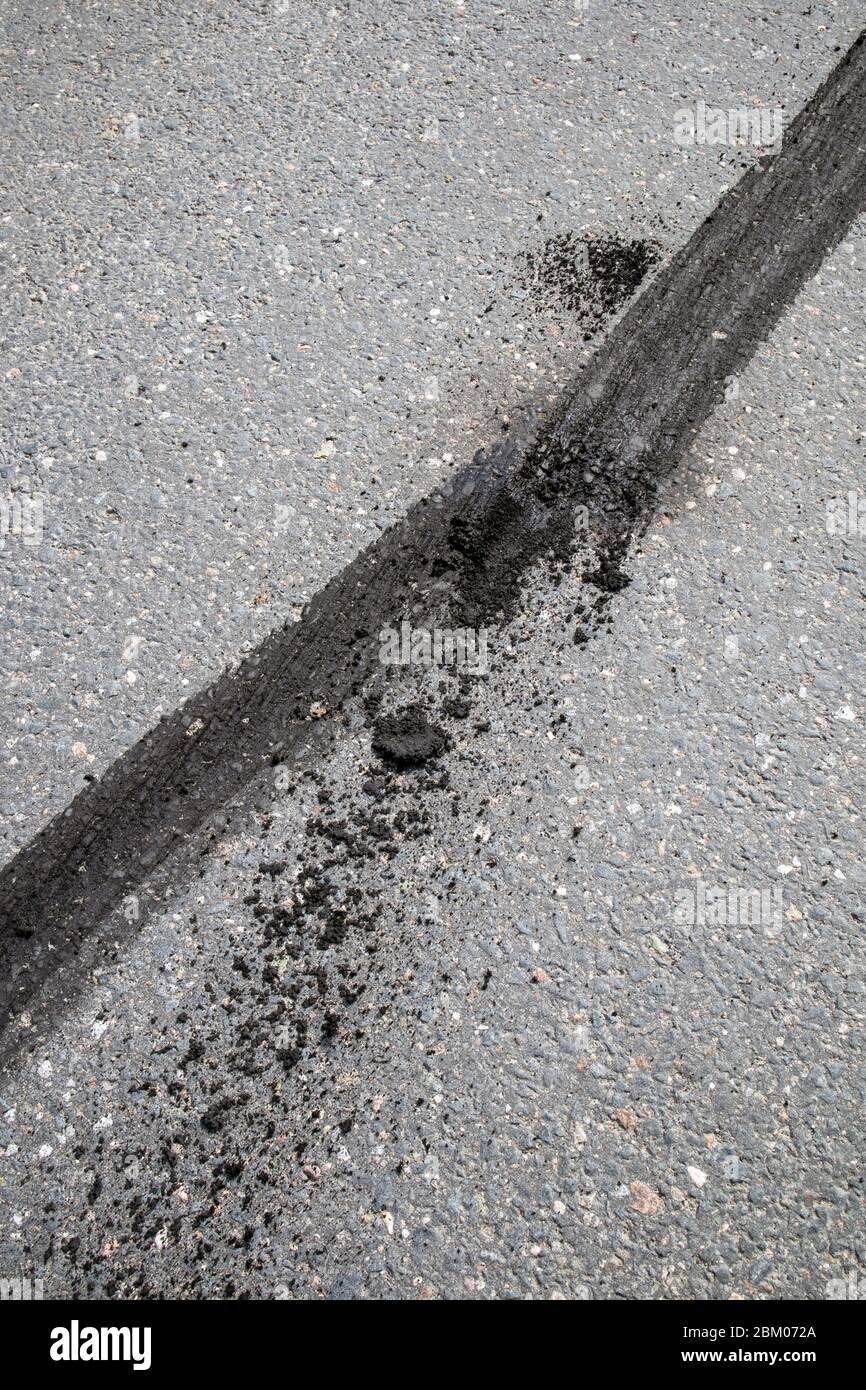 car tyre skid marks on road Stock Photo Alamy