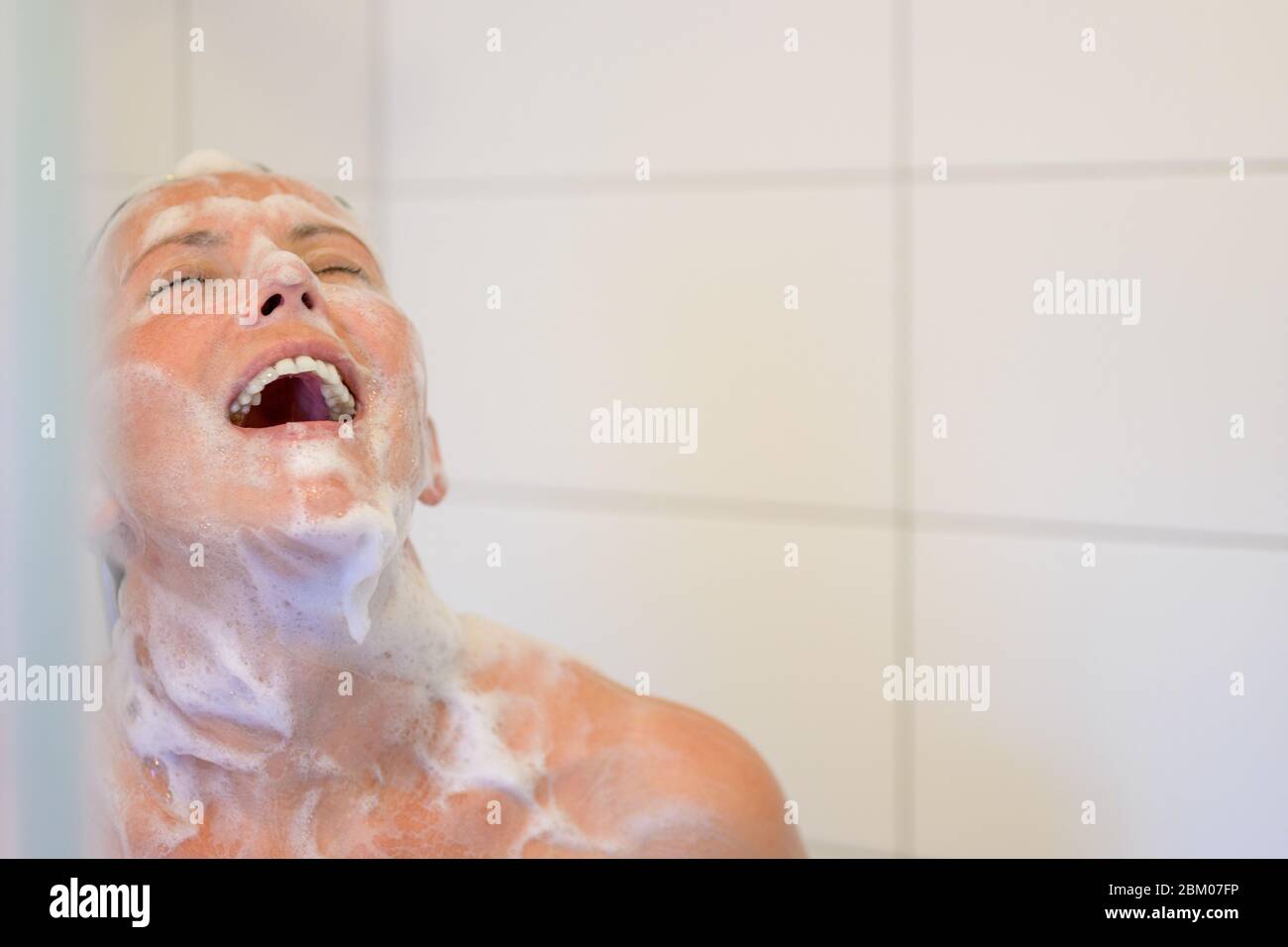 Hispanic and soap suds face hi-res stock photography and images - Alamy