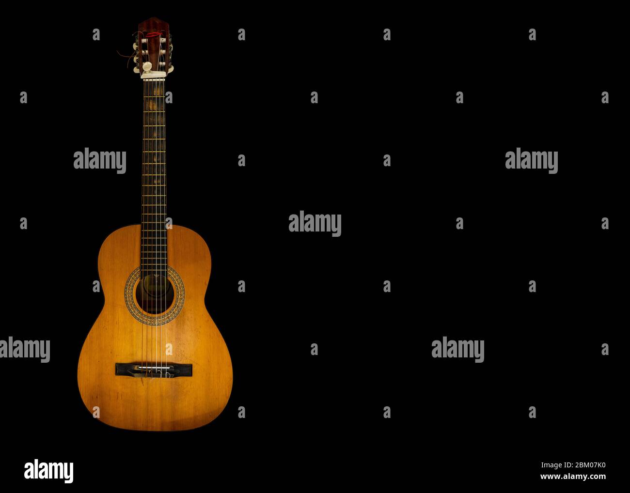 Guitar image from front perspective on black background Stock Photo